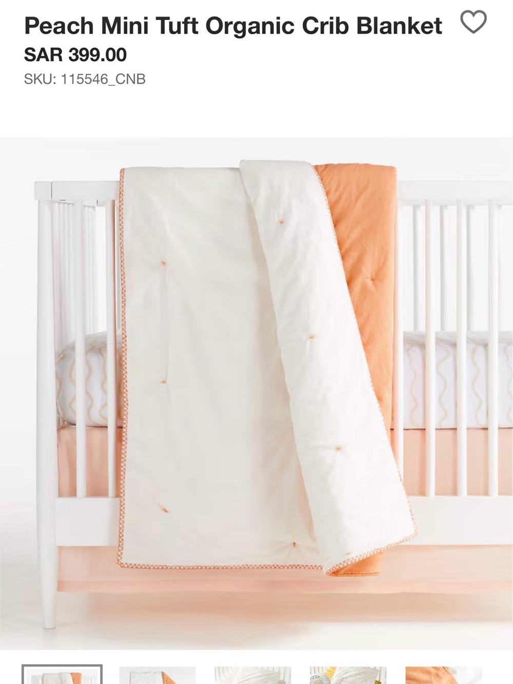 Crate and Barrel, Crate and Kids mini tufted crib quilt. Peach color